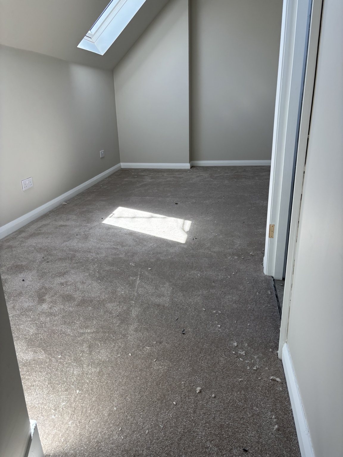 Grey attic bedroom carpet fitted in Doncaster home