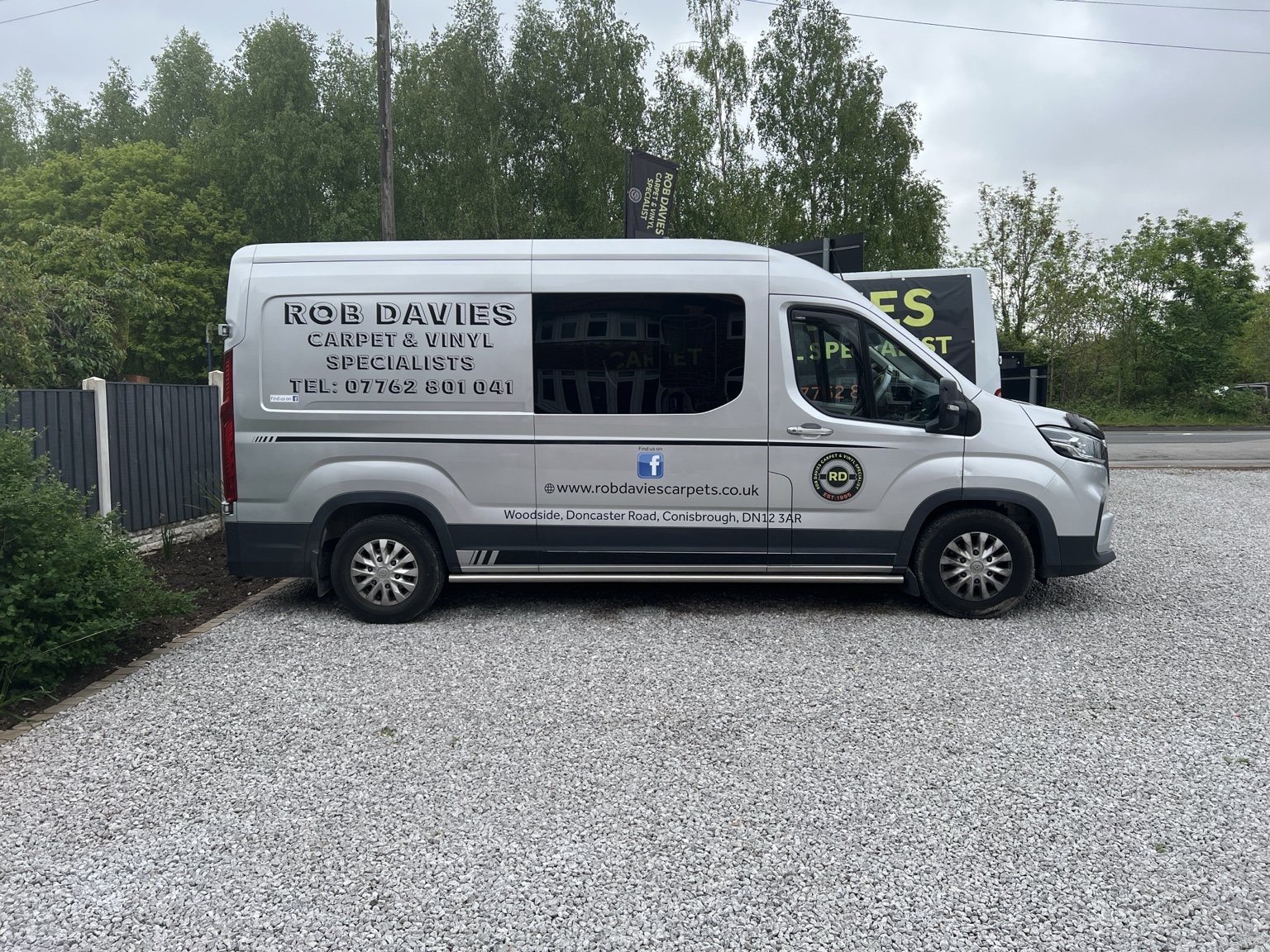 Rob Davies carpet and vinyl van outside showroom in Doncaster